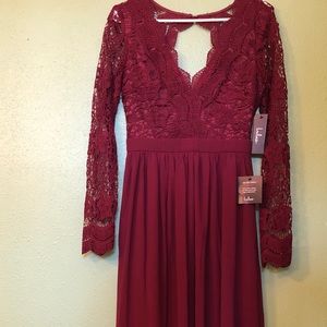 Gorgeous burgundy laced dress. Perfect for events